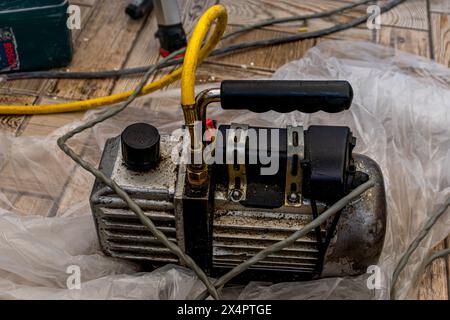 Air conditioning, HVAC service technician using gauges Lviv Ukraine 08.04.24 Stock Photo