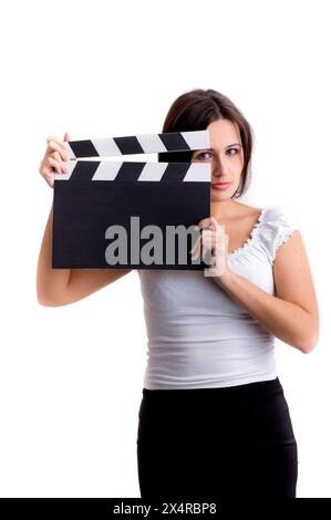 Pretty young woman holding a clapper, isolated on white Stock Photo