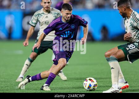 Charlotte, North Carolina, USA. 4th May, 2024. Charlotte FC midfielder NIKOLA PETKOVIC (23) attacks the ball during the second half of the Charlotte FC vs Portland Timbers MLS match at Bank of America Stadium in Charlotte, NC on May 4, 2024. (Credit Image: © Cory Knowlton/ZUMA Press Wire) EDITORIAL USAGE ONLY! Not for Commercial USAGE! Credit: ZUMA Press, Inc./Alamy Live News Stock Photo