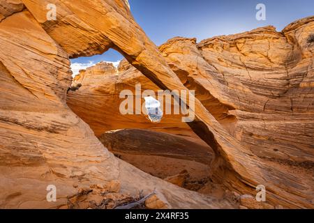 Melody Arch at Marble Canyon during sunrise near The Wave, Coyote Buttes North at Paria Canyon, Vermilion Cliffs National Monument, Arizona, USA Stock Photo