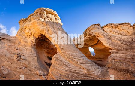 Panorama of Melody Arch at Marble Canyon during sunrise near The Wave, Coyote Buttes North, Vermilion Cliffs National Monument, Arizona, USA Stock Photo