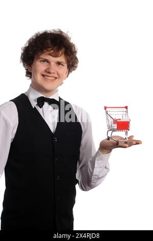 young handsome waiter with small metal shopping cart, isolated on white Stock Photo