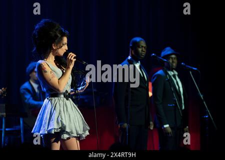 RELEASE DATE: May 10, 2024. TITLE: Back To Black. STUDIO: Focus Features. DIRECTOR: Sam Taylor-Johnson. PLOT: A never-before-seen glimpse into Amy Winehouse's early rise to fame and the release of her groundbreaking studio album, Back to Black. STARRING: MARISA ABELA as Amy Winehouse. (Credit Image: © Focus Features/Entertainment Pictures/ZUMAPRESS.com) EDITORIAL USAGE ONLY! Not for Commercial USAGE! Stock Photo