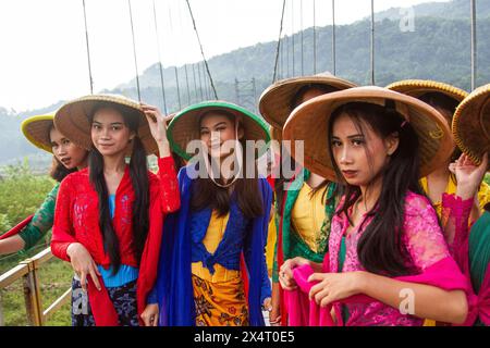 Sumedang, West Java, Indonesia. 5th May, 2024. Women wearing traditional cloth poses for photo during the Rice Field Festival in Baginda Village. The Rice Field Festival, organized by the Baginda Village Youth Organization, was held to maintain the local culture and art of Sundanese culture. (Credit Image: © Algi Febri Sugita/ZUMA Press Wire) EDITORIAL USAGE ONLY! Not for Commercial USAGE! Stock Photo