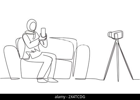 Continuous one line drawing Arab female influencer filming video review smartphone on dslr camera at home. Blogger advertising tech product, streaming Stock Vector