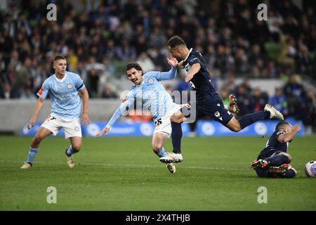 MELBOURNE, AUSTRALIA. 5 May 2024. Pictured: Melbourne City defender Callum Talbot(25) (left) and Frenchman Damien Da Silva(5) of Melbourne Victory get airborne during the A Leagues Soccer, Melbourne Victory FC v Melbourne City FC elimination series at Melbourne's AAMI Park. Credit: Karl Phillipson/Alamy Live News Stock Photo