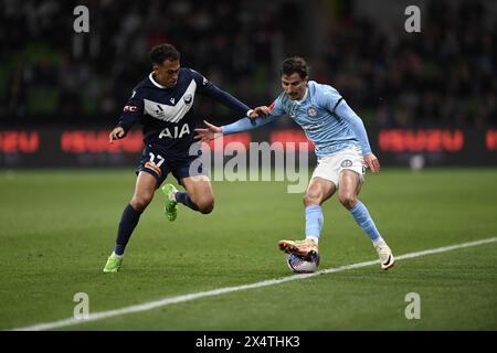 MELBOURNE, AUSTRALIA. 5 May 2024. Pictured: Nishan Velupillay(17) of Melbourne Victory tackles Melbourne City defender Callum Talbot(25) during the A Leagues Soccer, Melbourne Victory FC v Melbourne City FC elimination series at Melbourne's AAMI Park. Credit: Karl Phillipson/Alamy Live News Stock Photo