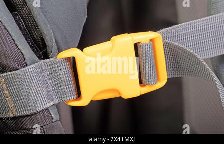 Yellow plastic clasp of backpack, full frame image Stock Photo
