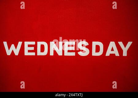 Wednesday Word on a Red Background Stock Photo