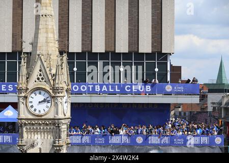 Leicester City players and management lift the trophy on the balcony during a parade in Leicester to celebrate winning the Sky Bet Championship title. Picture date: Sunday May 5, 2024. Stock Photo