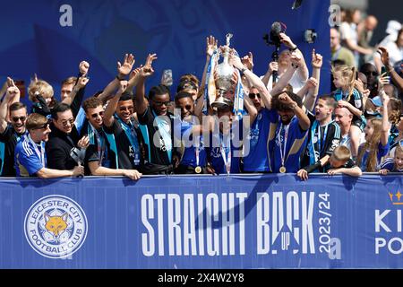 Leicester City players and management lift the trophy on the balcony during a parade in Leicester to celebrate winning the Sky Bet Championship title. Picture date: Sunday May 5, 2024. Stock Photo