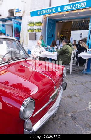 Sorrento Italy - typical Italy street scene with red car, Sorrento street, Campania. Italian lifestyle in summer Stock Photo