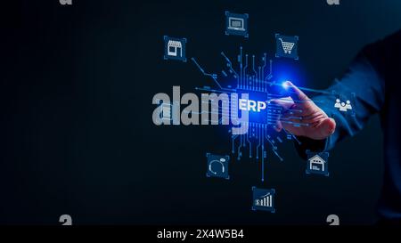A person is drawing a blue ERP logo with a hand. The logo is surrounded by various icons and symbols, representing the different aspects of the ERP sy Stock Photo