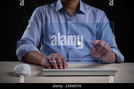 Virtual video playback control overlay on a desktop, symbolizing media management. Stock Photo