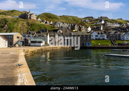 Gardenstown Harbour, a picturesque fishing harbour located in the village of Gardenstown in Aberdeenshire, Scotland. Stock Photo