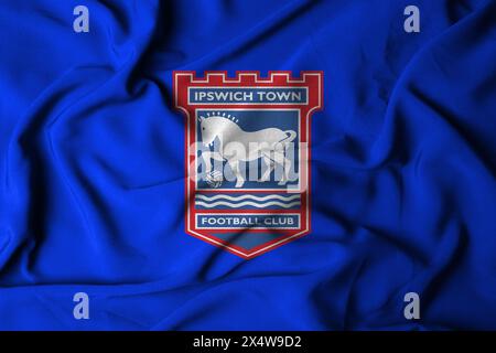 selective focus of IPSWICH TOWN FC logo. Ipswich town football club, Suffolk, UK. with a flowing fabric texture. 3D illustration Stock Photo