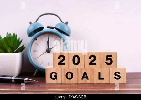 2025 goals text and number engraved on wood block Stock Photo