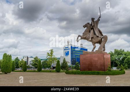 The monument of World War II Chechen soldier Movlid Visaitov close to the museum of Chechen Republic ex-president Akhmad Kadyrov in Grozny, Chechnya Stock Photo