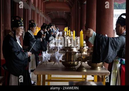 Seoul, South Korea. 5th May, 2024. People wearing traditional costumes participate in the 'Jongmyo Daeje' ceremony, a royal ancestral rite, at the Jongmyo Shrine in Seoul, South Korea, May 5, 2024. Credit: Jun Hyosang/Xinhua/Alamy Live News Stock Photo