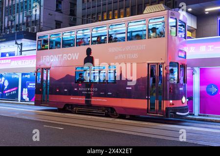 Hong Kong - April, 2024: Hong Kong Tramways is a public transport. Hong Kong Ding Ding with classic and unique style of double-deck tram. Stock Photo