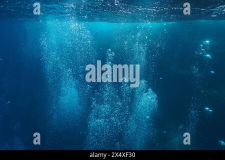 Air bubbles underwater rising to water surface in the Mediterranean sea, natural scene, Spain Stock Photo