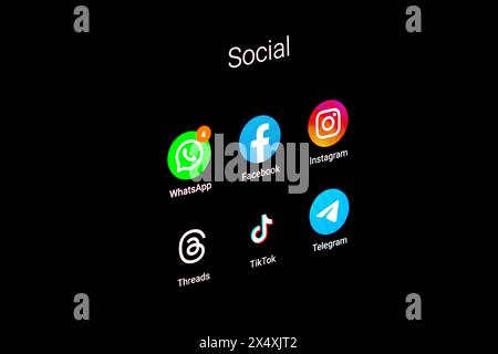 In this photo illustration, social networks (WhatsApp, Facebook, Instagram, Threads, TikTok and Telegram) logos seen displayed on a smartphone. Stock Photo