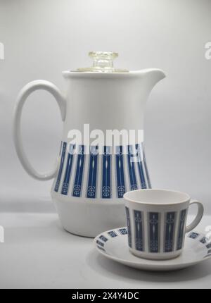 Coffee pot with cup and saucer Stock Photo