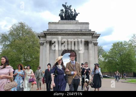 London, UK, 5th May, 2024. Participants in period tailoring take part in the fourth Grand Flaneur Walk in the St James's area and beyond, with no destination in mind, popularised by the 19th century tradition of wandering around aimlessly. The event, organised by the Chap magazine, coincides with its 25th anniversary. Credit: Eleventh Hour Photography/Alamy Live News Stock Photo