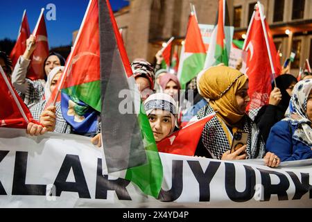 Istanbul, Turkey. 05th May, 2024. A girl takes part during the march. Hundreds of people marched in Istanbul on the evening of May 5th to express their solidarity with the Palestinian people. The demonstrators condemned Israeli attacks and called for an immediate ceasefire and humanitarian aid access. The march echoed global calls for peace in the region. Credit: SOPA Images Limited/Alamy Live News Stock Photo