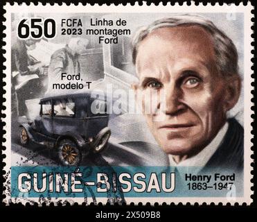 Henry Ford portrait and his Model T on postage stamp Stock Photo