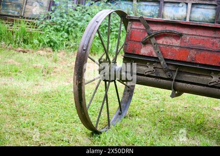 An old carriage in the farmyard Stock Photo