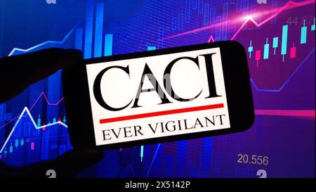 Konskie, Poland - March 17, 2024: CACI company logo displayed on mobile phone Stock Photo