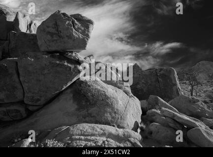 Dramatic black and white photo of boulders in Joshua Tree National Park Stock Photo