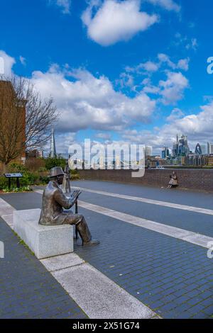 Bronze sculptures by Diane Gorvin from Dr Salter's Daydream group on the River Thames walk, Rotherhithe, Southwark, UK. With views of Tower Bridge and Stock Photo