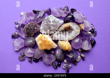 Beautiful purple druzy with amethyst and citrine crystals. Magical semi-precious stones. Stock Photo