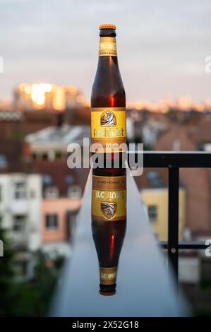 Brussels Capital Region, Belgium, May 5, 2024 - A bottle of blonde Archivist beer, a strong Belgian abbey beer Stock Photo