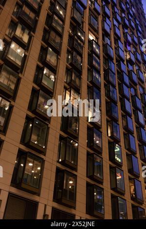 Evening view of a tall urban building, London UK Stock Photo