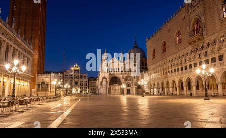 Illuminated Doge's Palace and St Mark's Basilica in Piazetta San Marco, blue hour, St Mark's Square, Venice, Veneto, Italy Stock Photo
