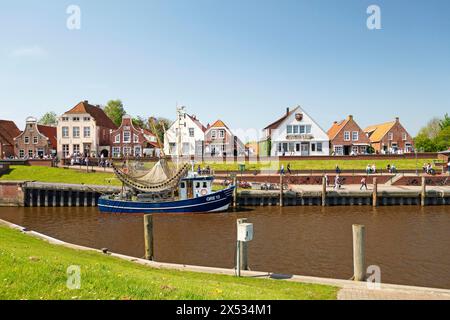 Picturesque cutter harbour, Greetsiel, gabled houses, Krummhoern, East Frisia, Germany Stock Photo