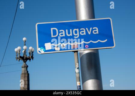 Sign with the inscription Daugava, flows through Russia, Belarus and Latvia, flows into the Baltic Sea after 1200 kilometres, Riga, Latvia Stock Photo