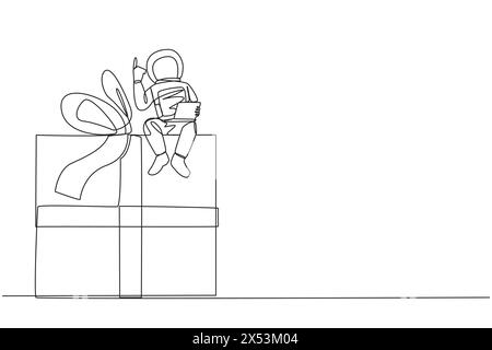 Continuous one line drawing young energetic astronaut sitting on giant gift box holding laptop raise one hand. Awesome space gift. Cosmonaut outer spa Stock Vector