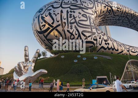 Dubai, UAE - January 16, 2024: Dubai museum of the Future from sheikh zayed road. Modern futuristic Museum built according designed by architect Shaun Killa. Cityscape skyline. Stock Photo