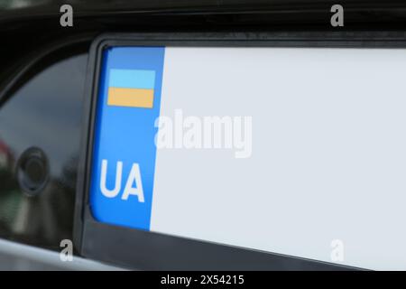 Car with vehicle registration plate, closeup view Stock Photo