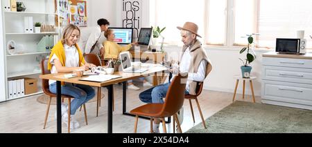 Team of graphic designers working in office Stock Photo