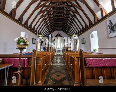 The image is of the interior of Christ Church in the town of Laxey on the Isle of Man. The roof made to resemble an upturned Viking Longship Stock Photo