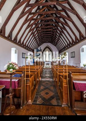 The image is of the interior of Christ Church in the town of Laxey on the Isle of Man. The roof made to resemble an upturned Viking Longship Stock Photo