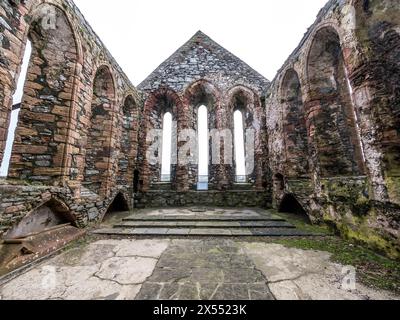 The image is of what was the interior of Peel Castle Abbey at the historic Peel Castle on the west coast of the Isle of Man. Stock Photo