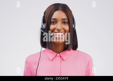 Portrait, woman and virtual assistant with headset for call centre, communication and smile. Indian female person, pride and microphone for talking Stock Photo
