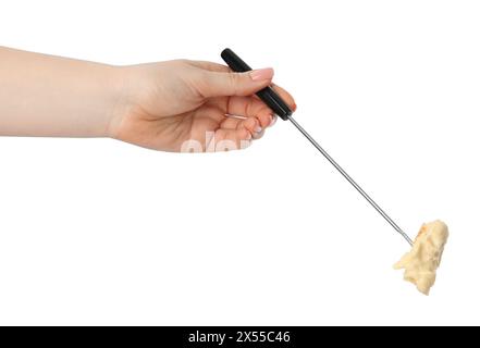 Tasty fondue. Woman holding fork with piece of bread and melted cheese on white background, closeup Stock Photo