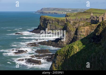 Dunluce Castle perched on the dramatic clifftops of the Causeway Coast, County Antrim, Northern Ireland.  Spring (March) 2024. Stock Photo